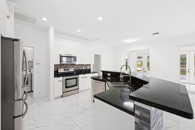 1209 Olympic Circle, Greenacres, FL 33413