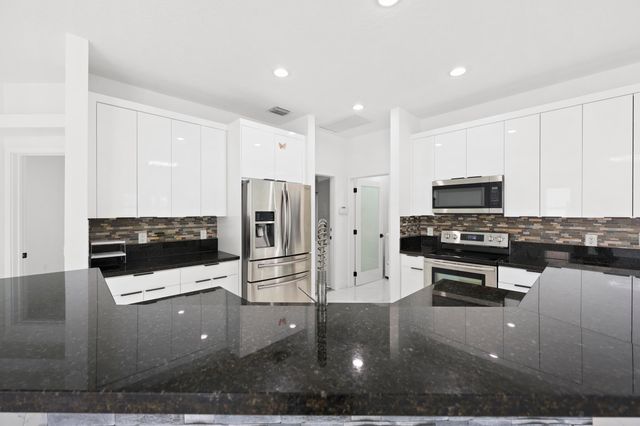 1209 Olympic Circle, Greenacres, FL 33413