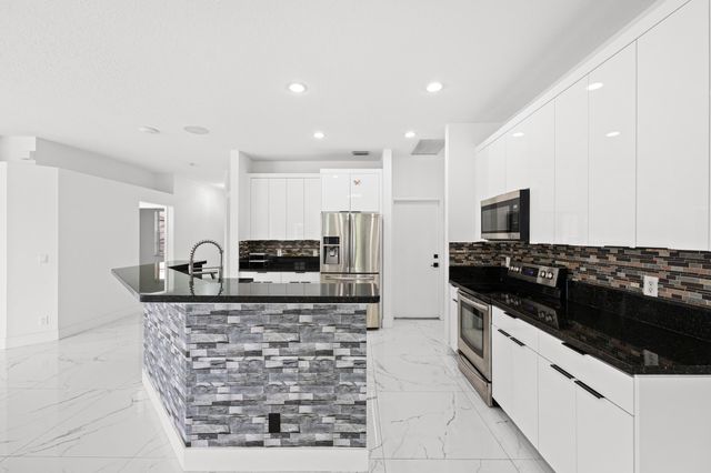 1209 Olympic Circle, Greenacres, FL 33413