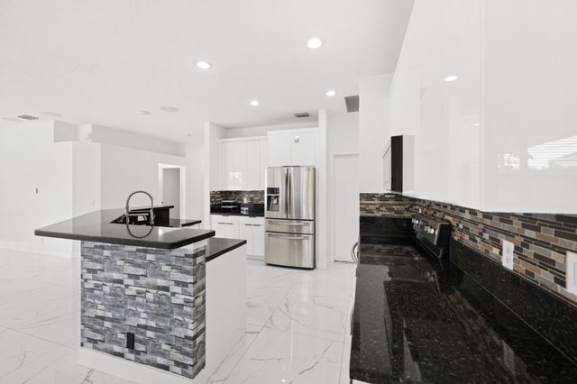 1209 Olympic Circle, Greenacres, FL 33413