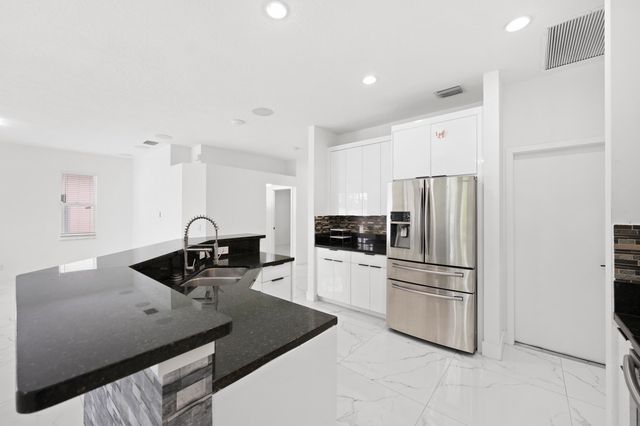 1209 Olympic Circle, Greenacres, FL 33413