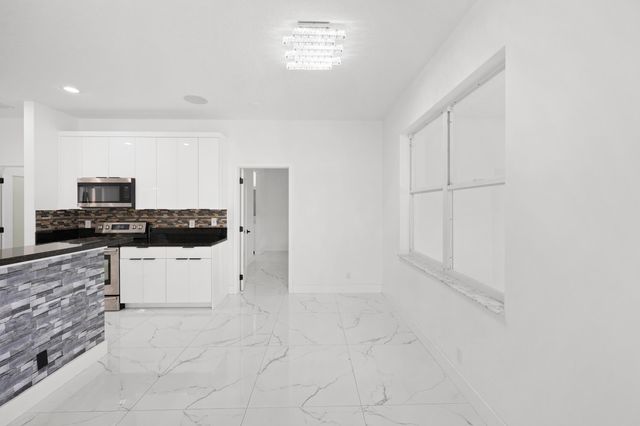 1209 Olympic Circle, Greenacres, FL 33413