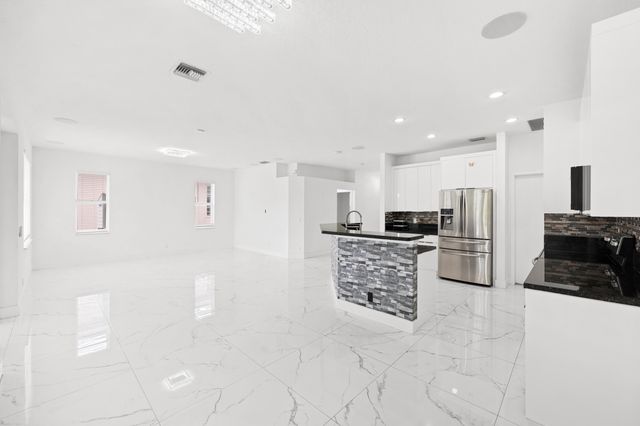 1209 Olympic Circle, Greenacres, FL 33413