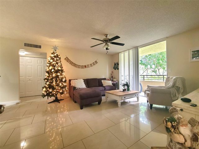801 Lyons Rd 19106, Coconut Creek, FL 33063