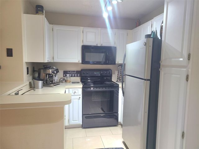 801 Lyons Rd 19106, Coconut Creek, FL 33063