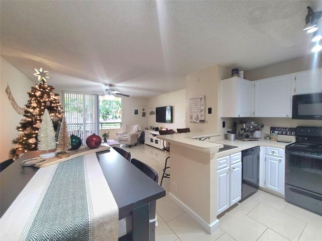 801 Lyons Rd 19106, Coconut Creek, FL 33063