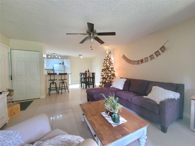 801 Lyons Rd 19106, Coconut Creek, FL 33063