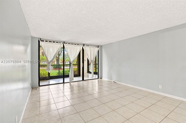 16325 Golf Club Rd 104, Weston, FL 33326