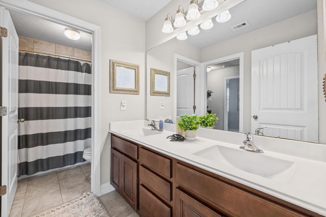 9706 Suffolk Downs Drive, Mont Belvieu, TX 77523