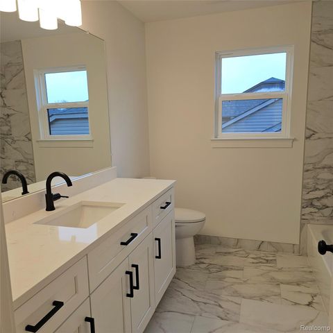 50829 Mistwood Drive, Macomb Township, MI 48042