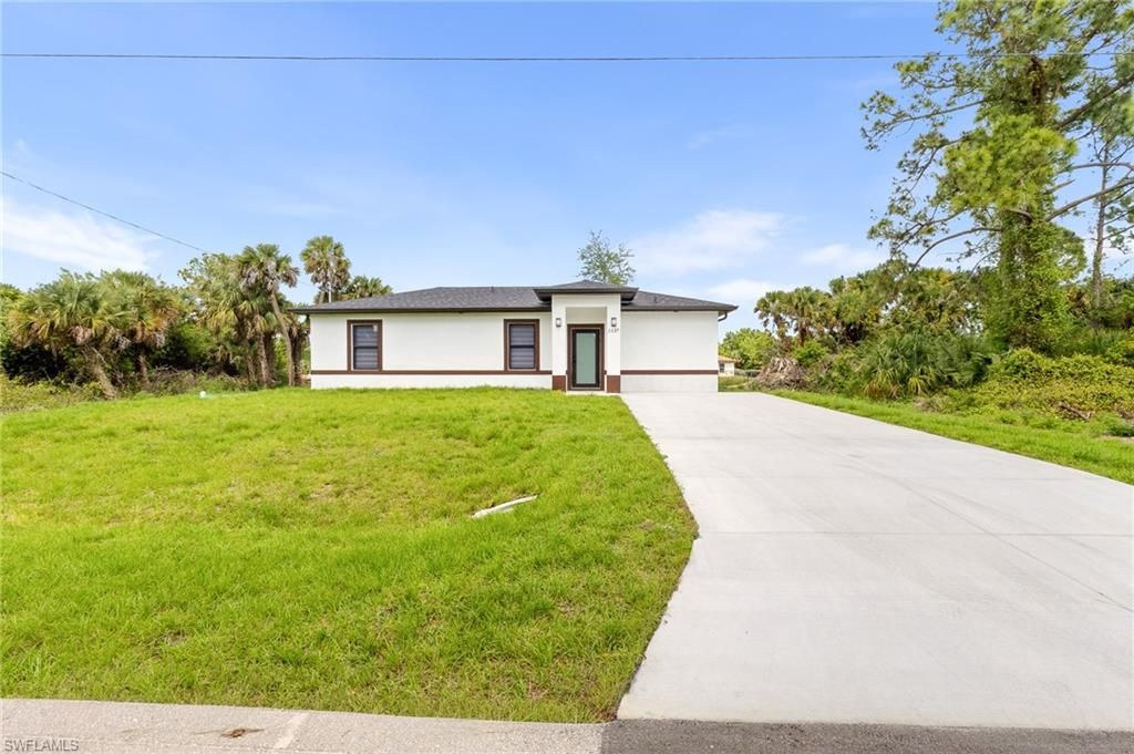 1137 Essex ST E, LEHIGH ACRES, FL 33974 — exterior