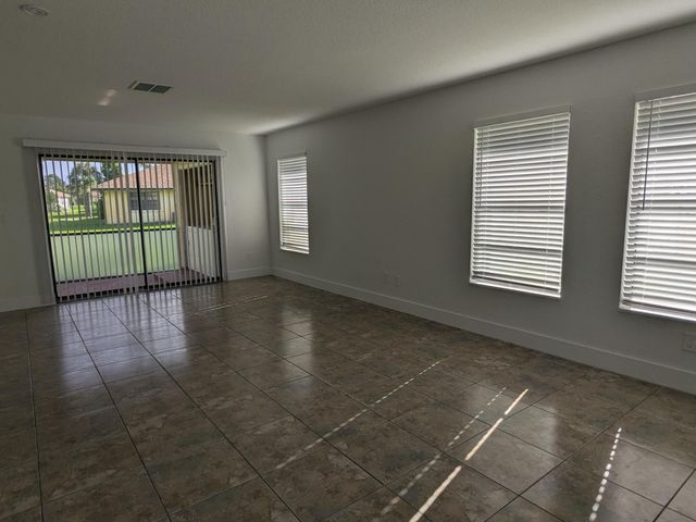 4949 Regina Court, West Palm Beach, FL 33415