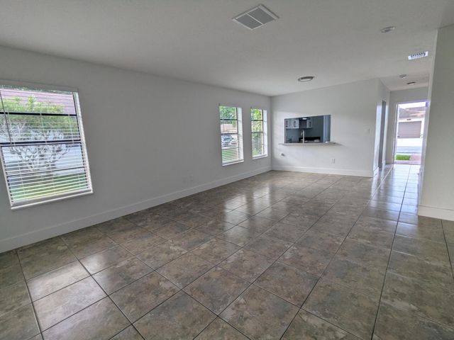 4949 Regina Court, West Palm Beach, FL 33415