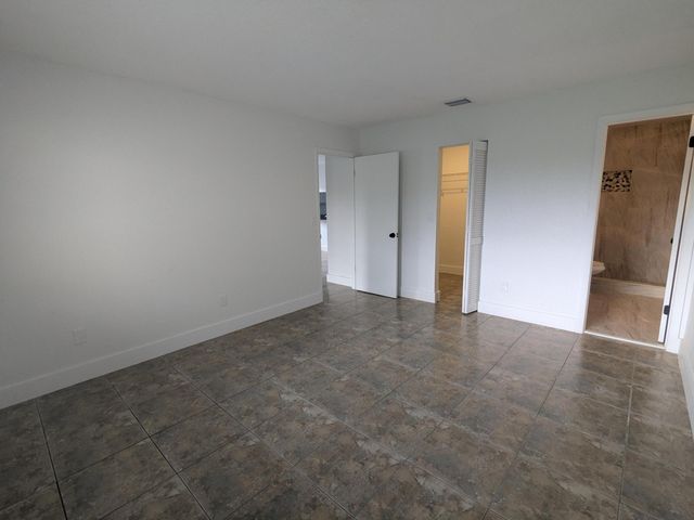 4949 Regina Court, West Palm Beach, FL 33415