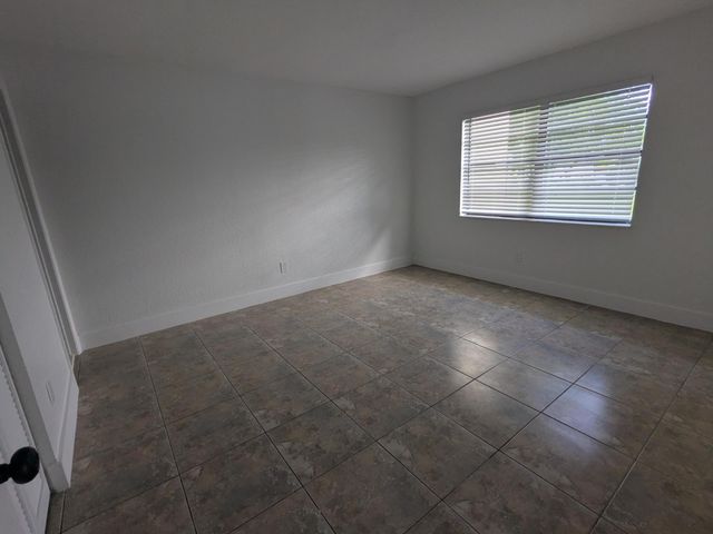 4949 Regina Court, West Palm Beach, FL 33415