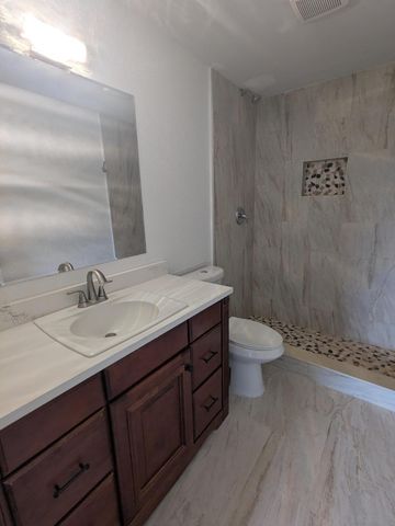 4949 Regina Court, West Palm Beach, FL 33415