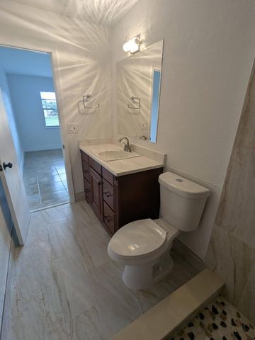 4949 Regina Court, West Palm Beach, FL 33415