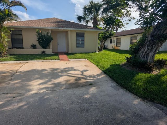4949 Regina Court, West Palm Beach, FL 33415