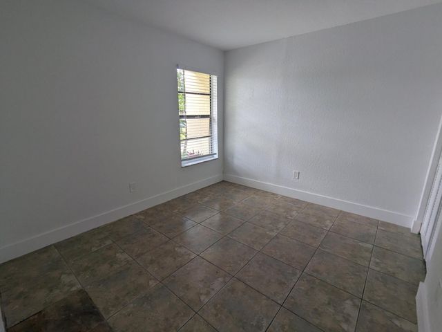 4949 Regina Court, West Palm Beach, FL 33415