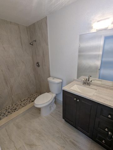 4949 Regina Court, West Palm Beach, FL 33415