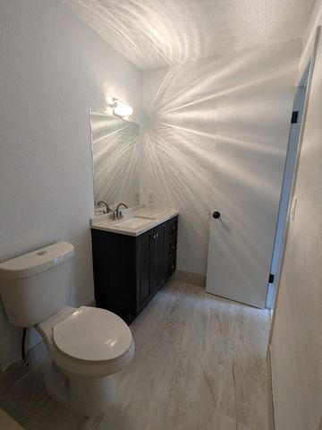 4949 Regina Court, West Palm Beach, FL 33415
