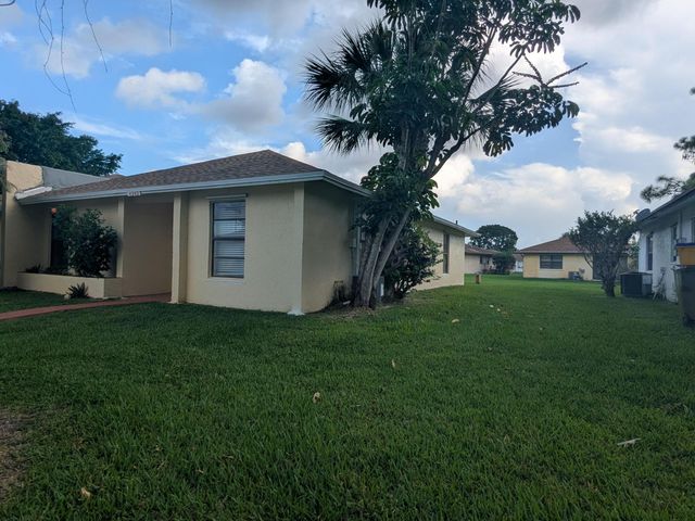 4949 Regina Court, West Palm Beach, FL 33415