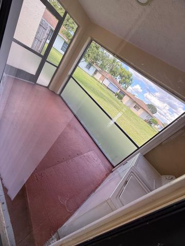 4949 Regina Court, West Palm Beach, FL 33415
