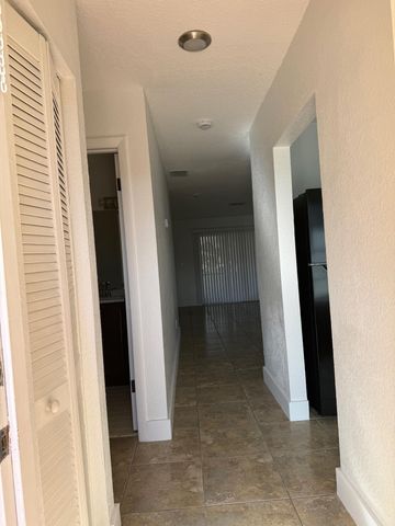 4949 Regina Court, West Palm Beach, FL 33415