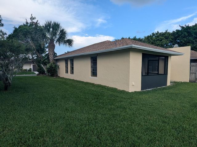 4949 Regina Court, West Palm Beach, FL 33415