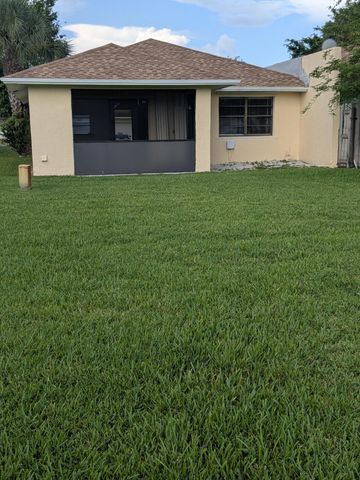 4949 Regina Court, West Palm Beach, FL 33415
