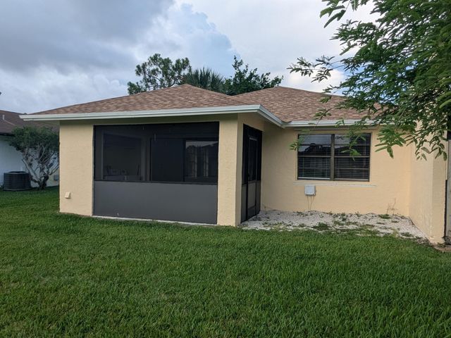 4949 Regina Court, West Palm Beach, FL 33415