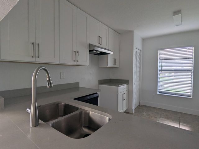 4949 Regina Court, West Palm Beach, FL 33415
