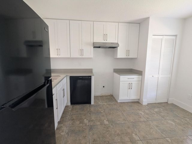 4949 Regina Court, West Palm Beach, FL 33415