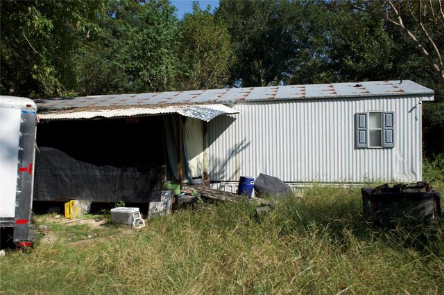 30727 Lake Edge Lane, Magnolia, TX 77354