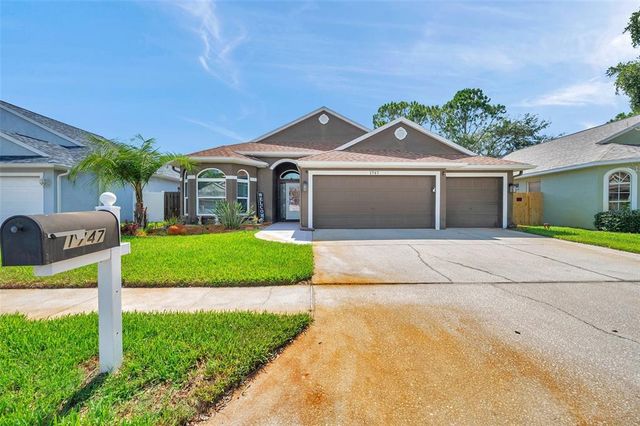 1747 WOOD BROOK STREET, Tarpon Springs, FL 34689