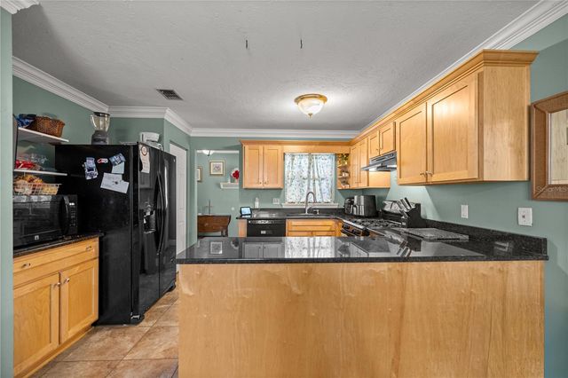 5947 AVENUE C, Mc Intosh, FL 32664