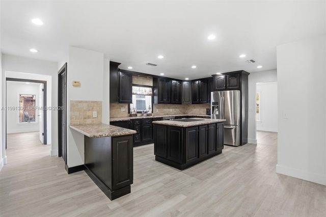 210 E SUGARLAND CIR, Clewiston, FL 33440