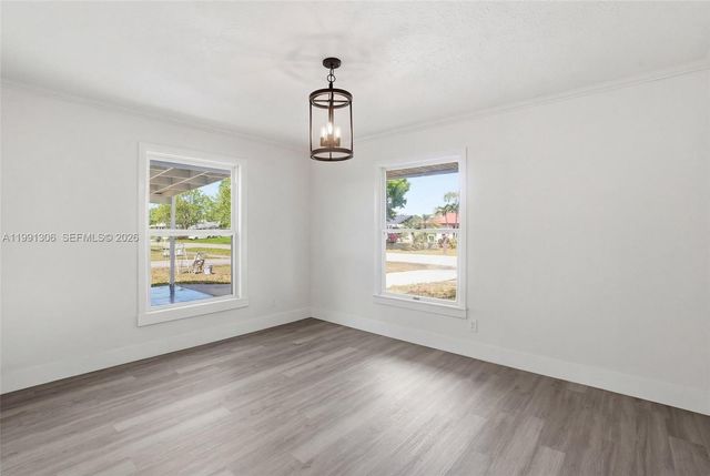 210 E SUGARLAND CIR, Clewiston, FL 33440