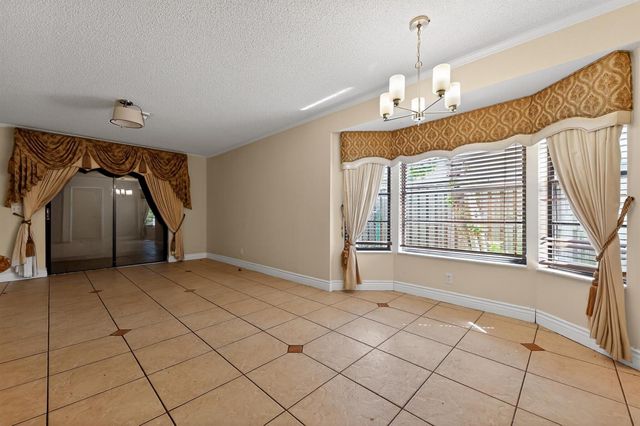 8421 Winnipesaukee Way, Lake Worth, FL 33467