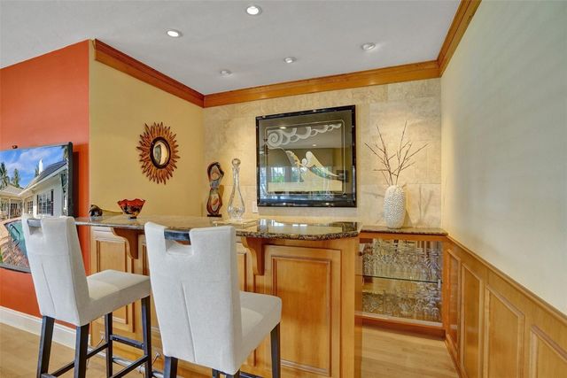 7 Saranac Road, Sea Ranch Lakes, FL 33308