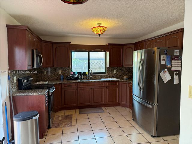 6010 NW 201st Ln, Hialeah, FL 33015