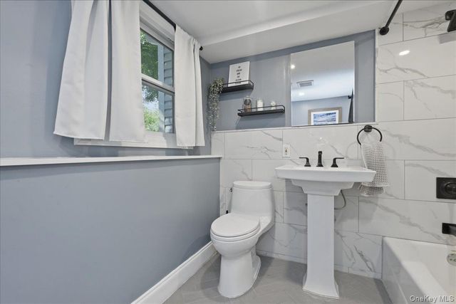 56 Glen Cove Drive, Glen Head, NY 11545