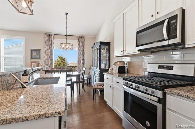 30879 Asbury Hill Court, New Hudson, MI 48165