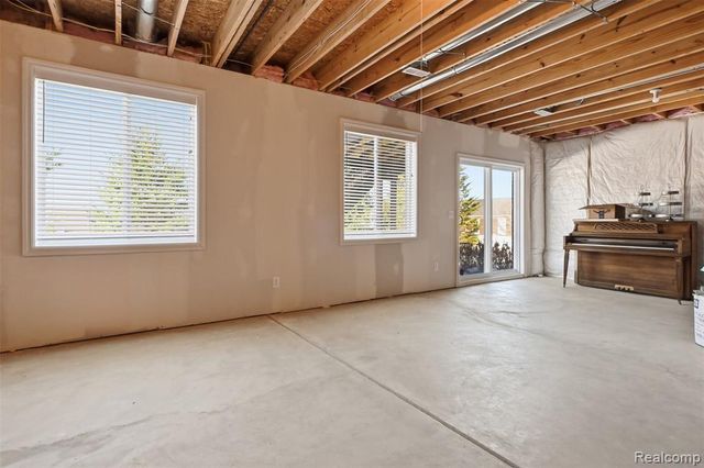 30879 Asbury Hill Court, New Hudson, MI 48165