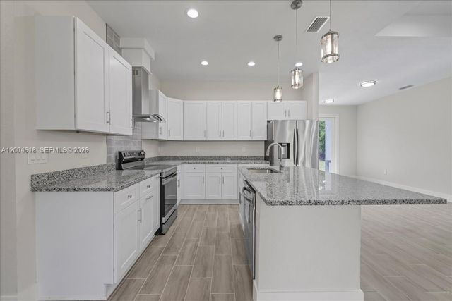 2804 11th ST W, Lehigh Acres, FL 33971