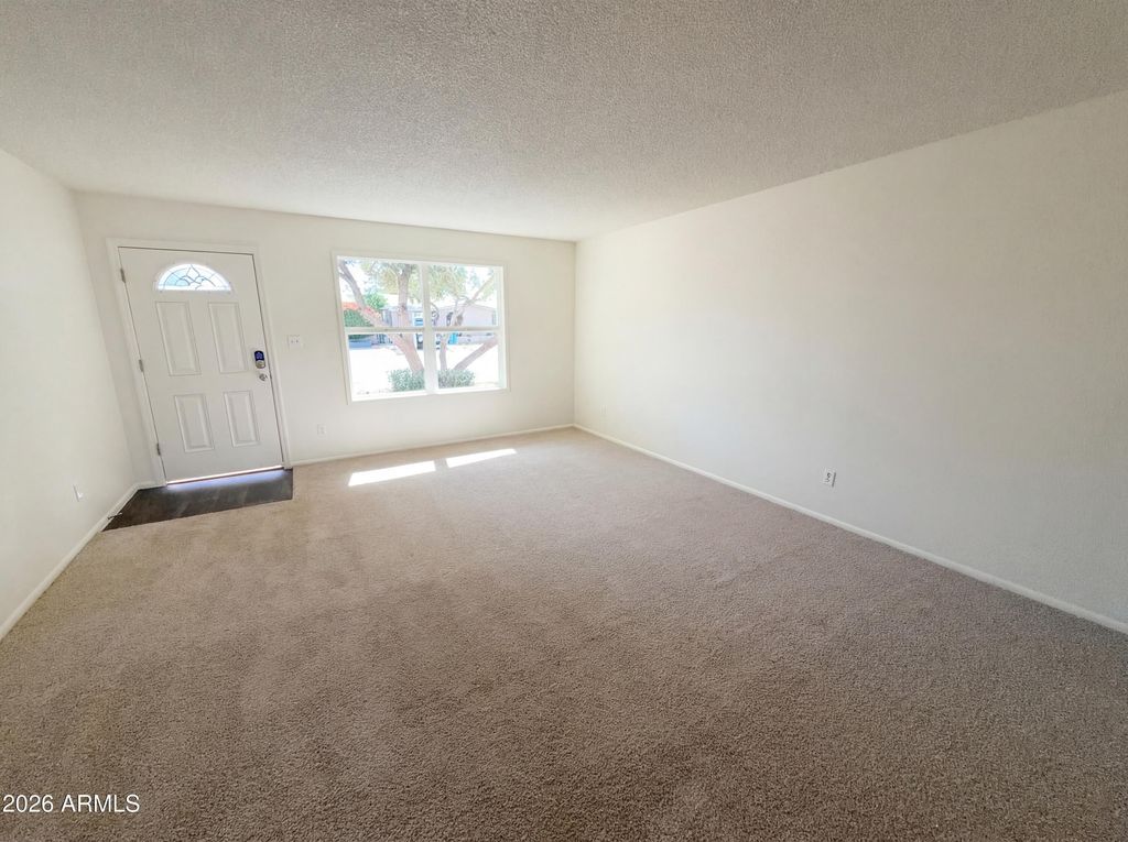 Image 3 of property listing at 4150 W MEDLOCK Drive, Phoenix, AZ 85019