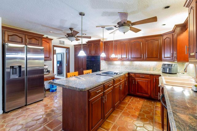 7951 W Lake Drive, Lake Clarke Shores, FL 33406