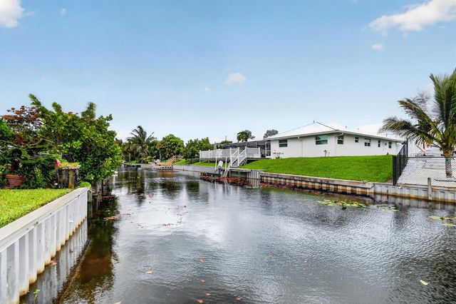 7951 W Lake Drive, Lake Clarke Shores, FL 33406