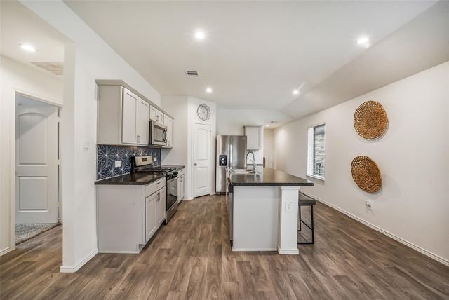 24322 Elmwood Falls Drive, Spring, TX 77373