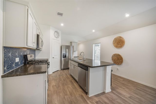 24322 Elmwood Falls Drive, Spring, TX 77373